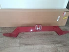 Genuine 2018-2022 Honda Accord Rear License Garnish Assembly (74890-TVA-A11) Used. Price: $100.00.
